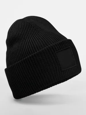 Bonnet à large revers avec patch ton sur ton