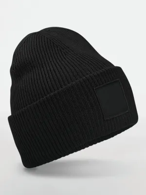 Bonnet à large revers avec patch ton sur ton