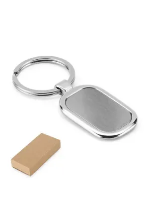 ZABEL. Metal keyring designed for customisation by doming