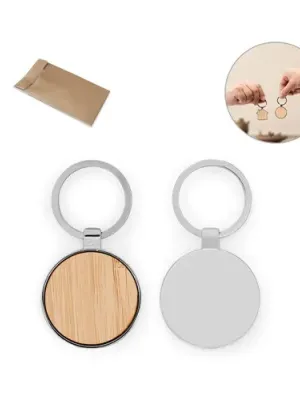 GASTON ROUND. Porte-clés rond en zinc et bambou