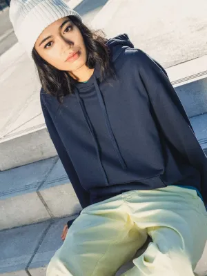 Sudadera sostenible con capucha y hombros caídos French Terry unisex