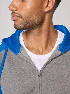 Chaqueta de felpa con cremallera y capucha bicolor unisex