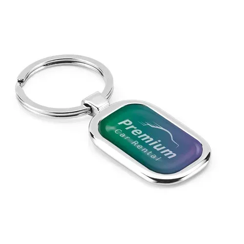ZABEL. Llavero de metal para doming