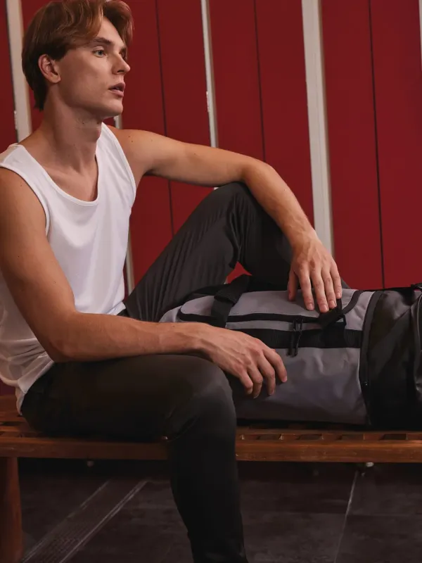 Sac de sport forme tube avec compartiment chaussures séparé